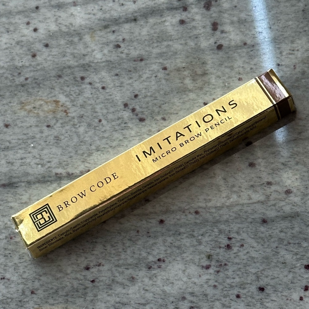 NEW IN BOX
Brow Code Imitations Micro Brow Pencil in Warm Medium Brown